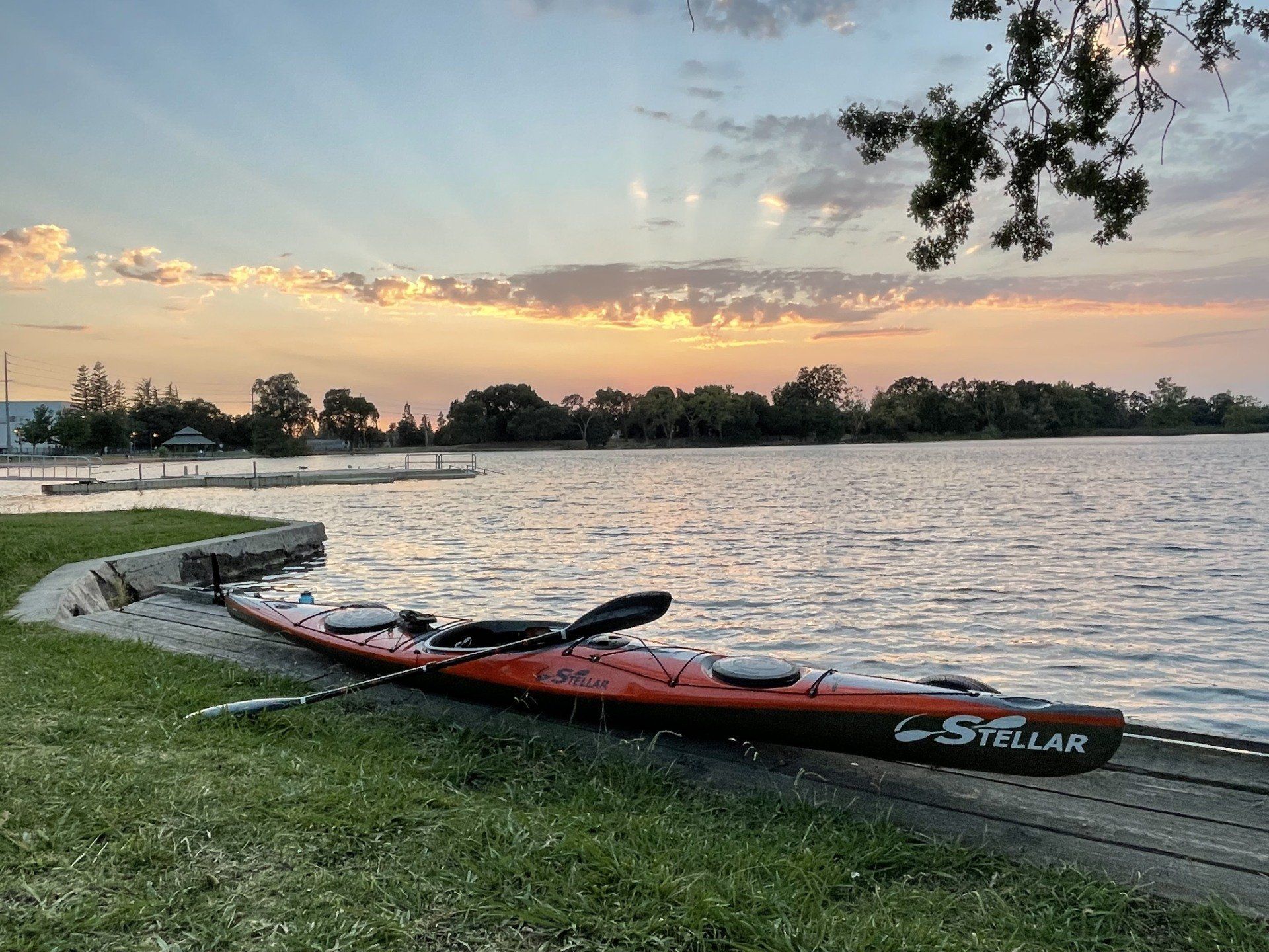 Stellar kayak parked on the pier during sunset