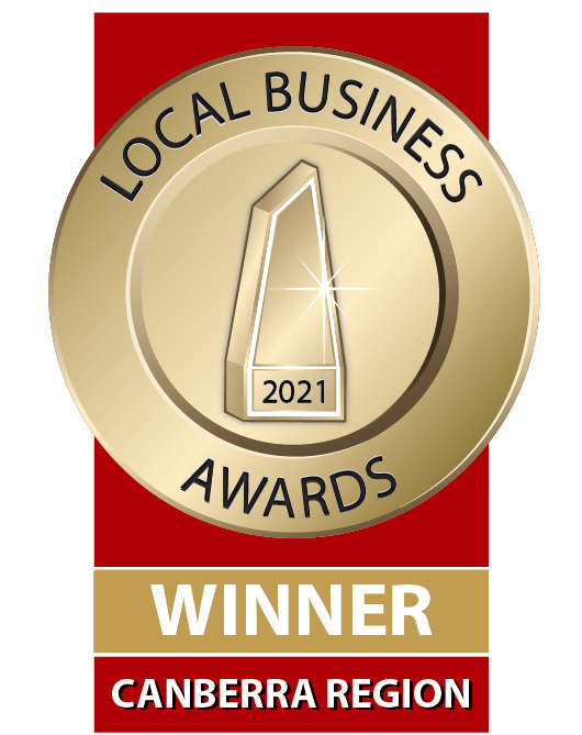 A gold badge that says local business awards winner canberra region