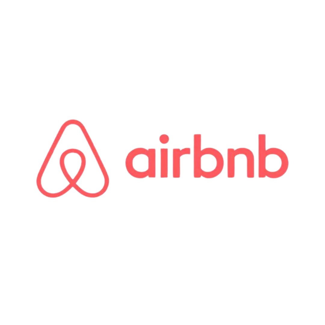 The airbnb logo is red and white on a white background.