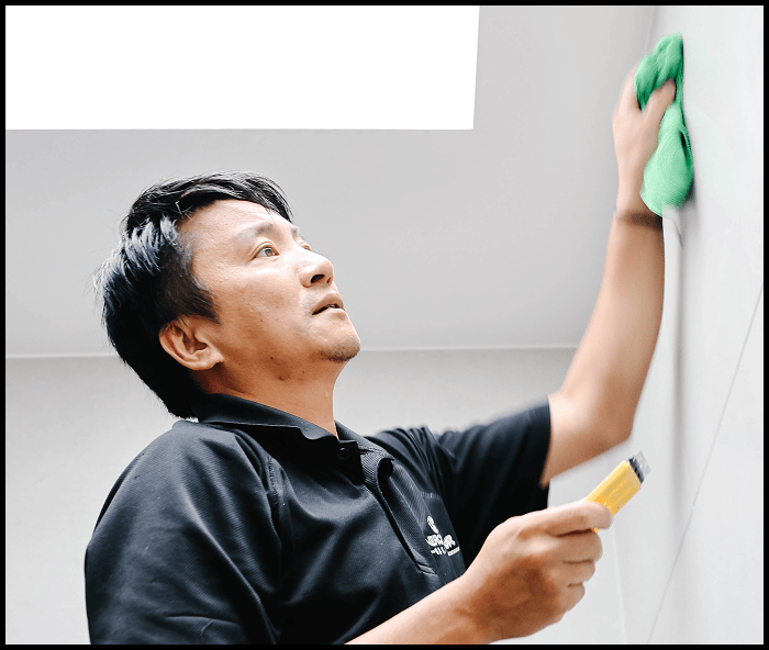 Cleaner using tools to inspect and clean high wall surface after construction