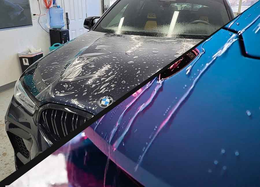 Two car hoods, one black, one blue, with water droplets. The black car features a BMW logo. Both are inside a garage.