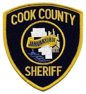 Cook County Sheriff patch, dark blue with yellow border.