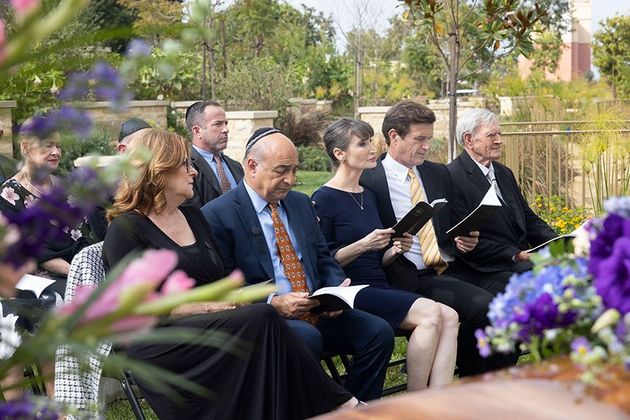 Family at Funeral being held at Hillside Memorial Park and Mortuary in Los Angeles, CA