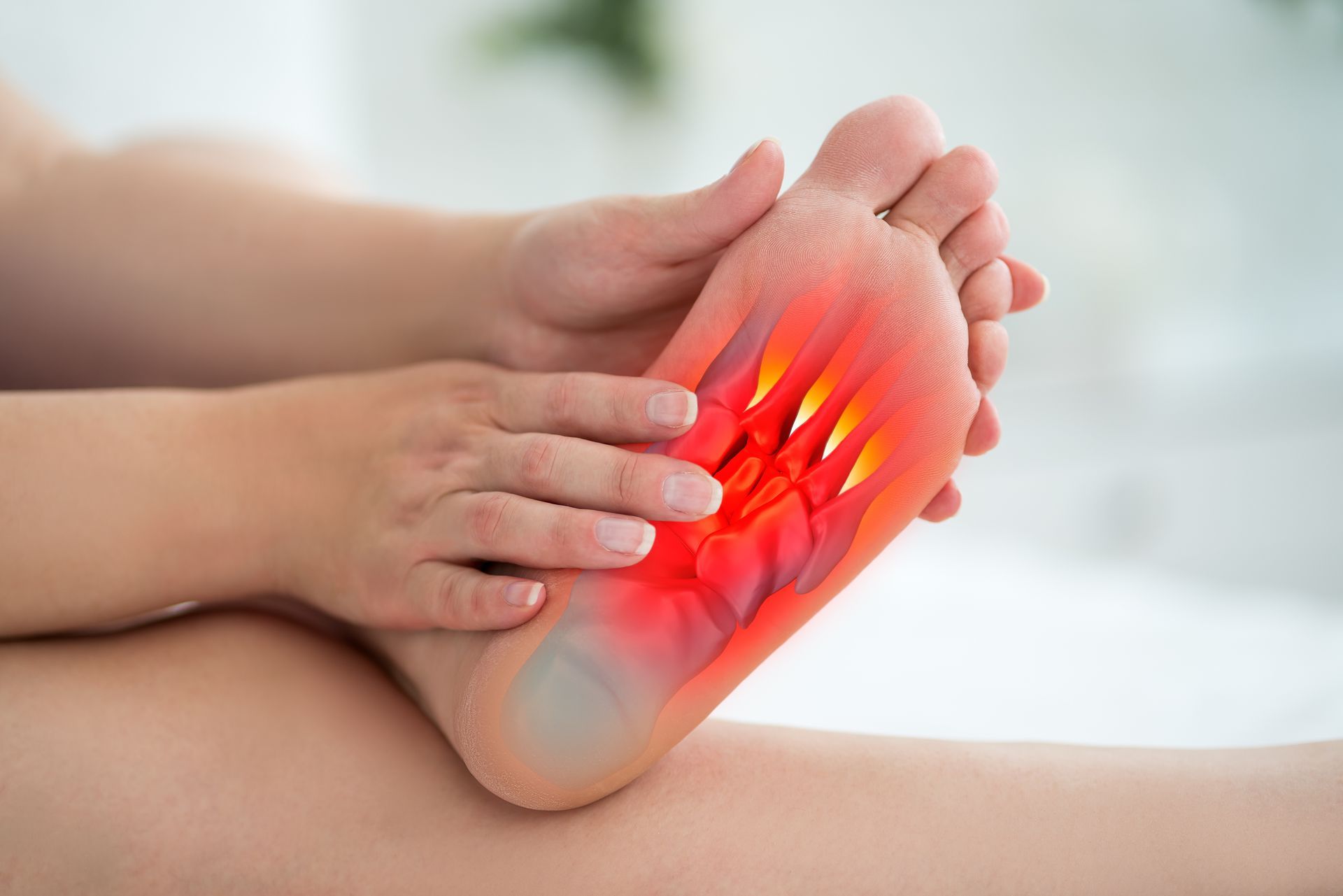 Person holding foot, highlighting pain on sole with red, fiery effect.