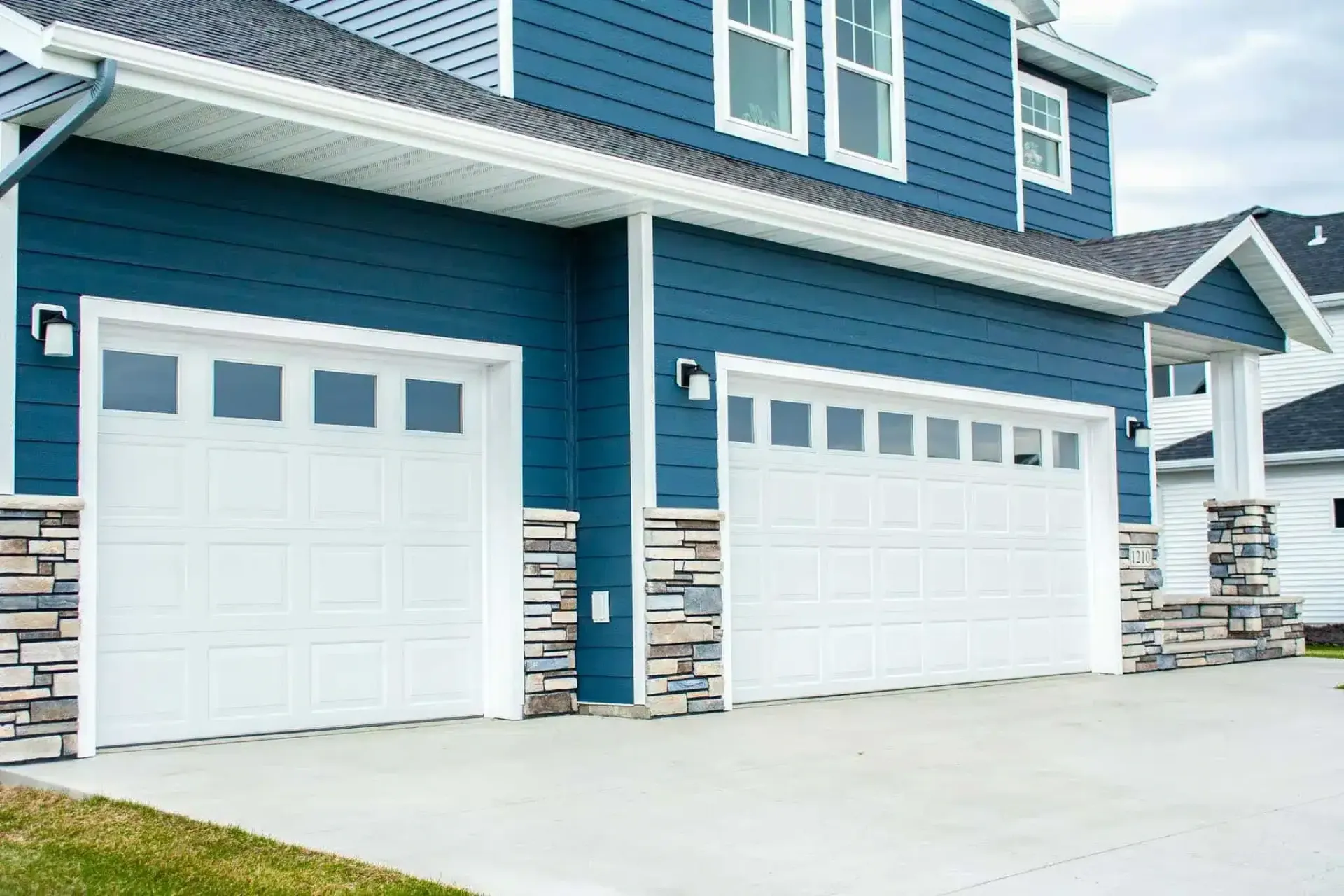 Traditional Aluminum Garage Doors enhance both security and curb appeal
