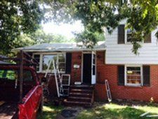Brick Home with Siding Work - Siding Replacement & Repair in Norfolk, VA