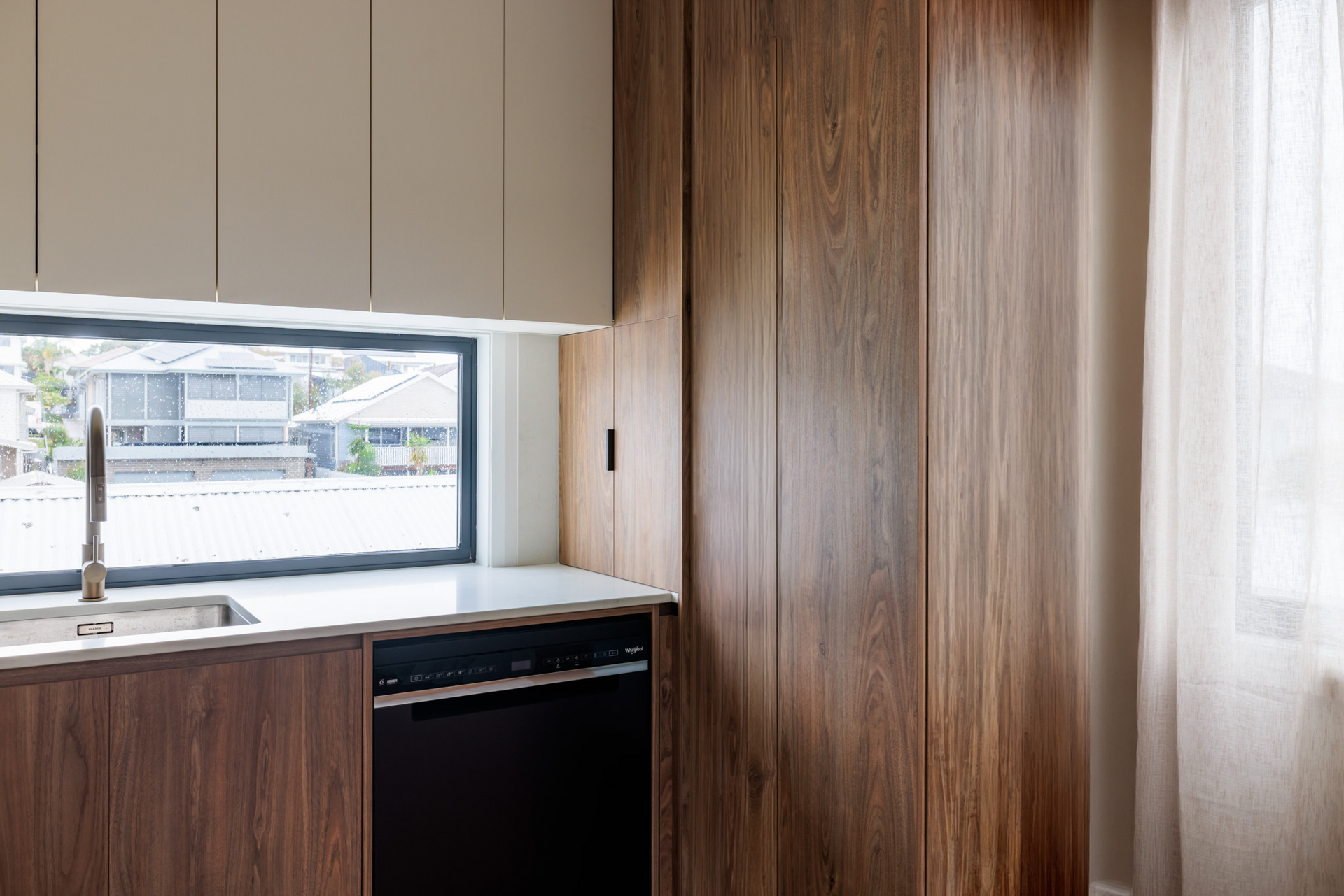Neutral kitchen fit-out with quality finishes and storage granny flat Brown Street Redhead by Altered Building and Renovations