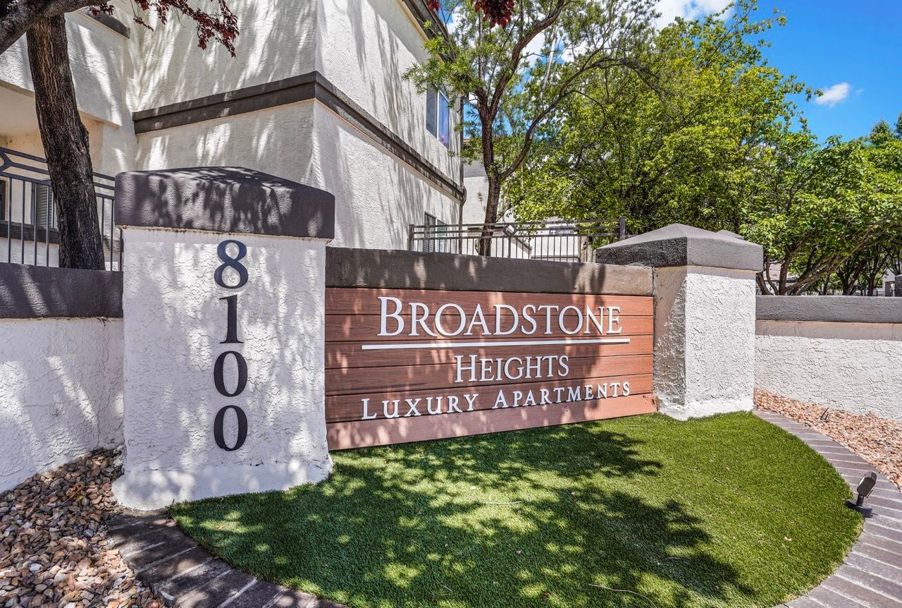 Exterior sign reading Broadstone Heights Luxury Apartments at a landscaped entry at Broadstone Heights in Albuquerque, NM.