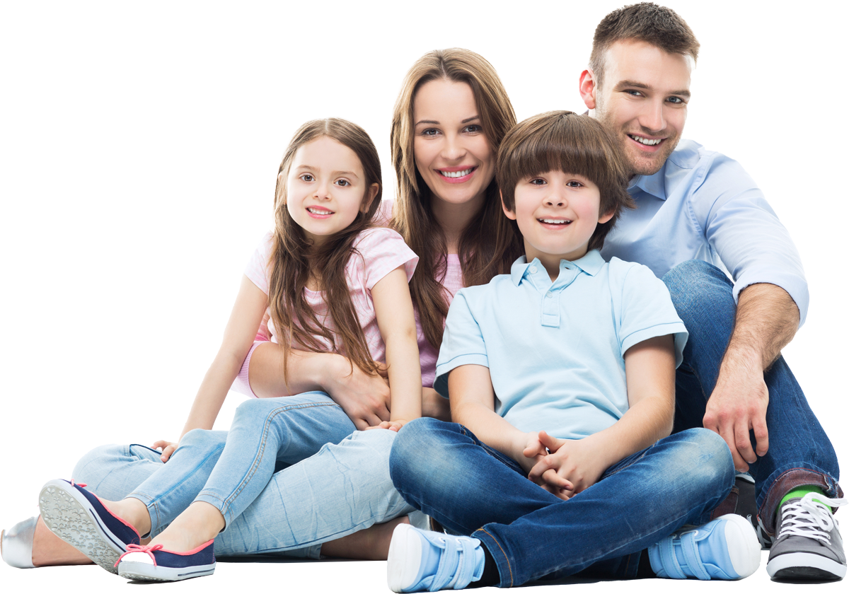 Family of four smiling, sitting close together; two children, parents, casual clothing, white background.
