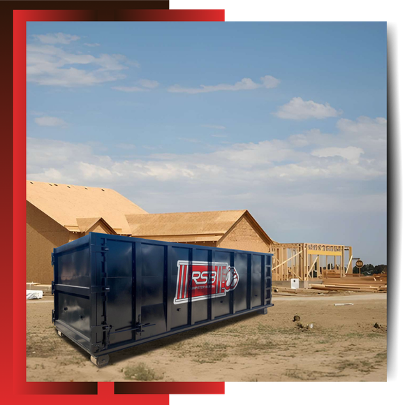 RSB Dumpster Rental parked in front of a house