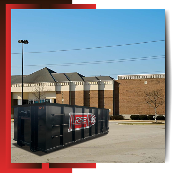 RSB Dumpster Rental parked in front of a house