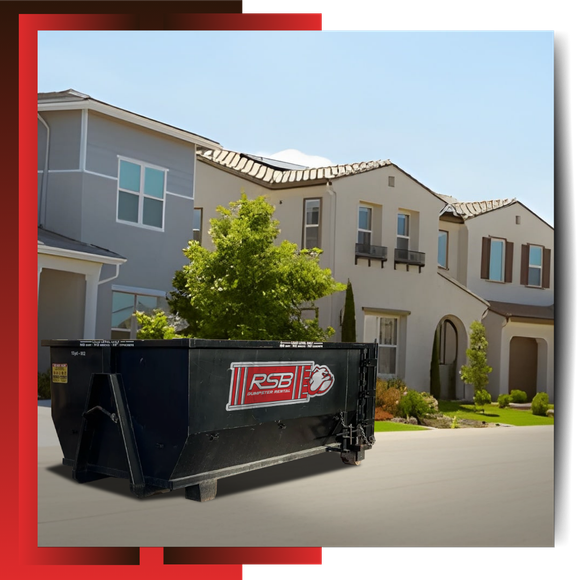 RSB Dumpster Rental parked in front of a house