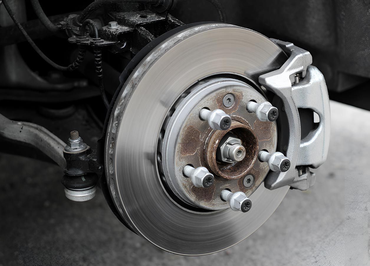 A Close Up of a Brake Disc on a Car — Cairns Mechanical Workshop In Bungalow, QLD