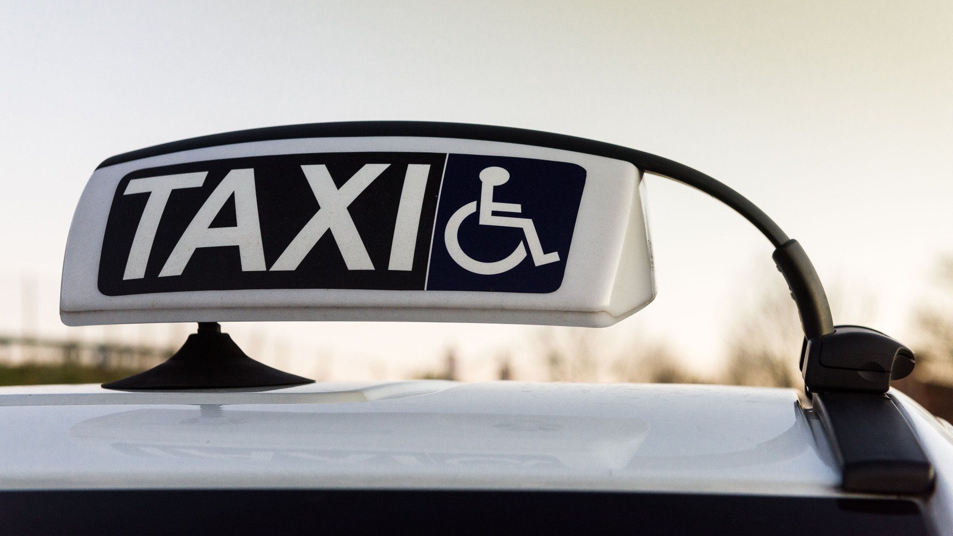 wheelchair accessible taxi in the road