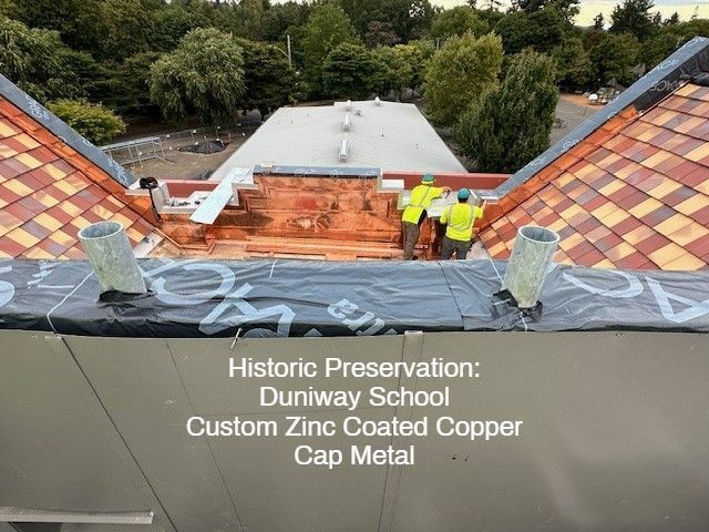 Workers on roof, copper flashing, tile roof, with zinc-coated copper cap metal for historic Dunaway School.