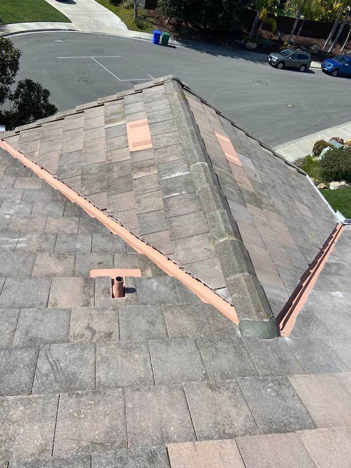 An aerial view of a roof with a drain on it