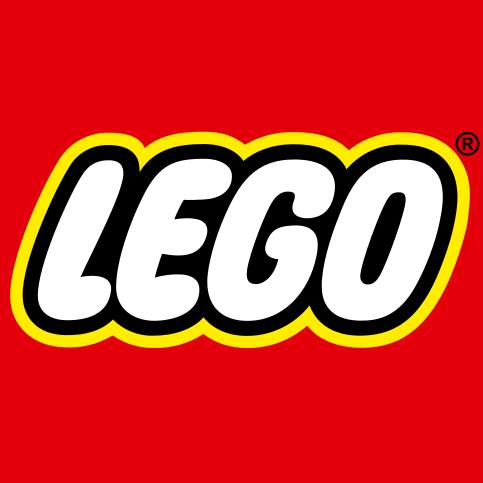 Lego's logo. Lego skrevet med hvid skrift, gul kant, på en cirkulær rød baggrund.