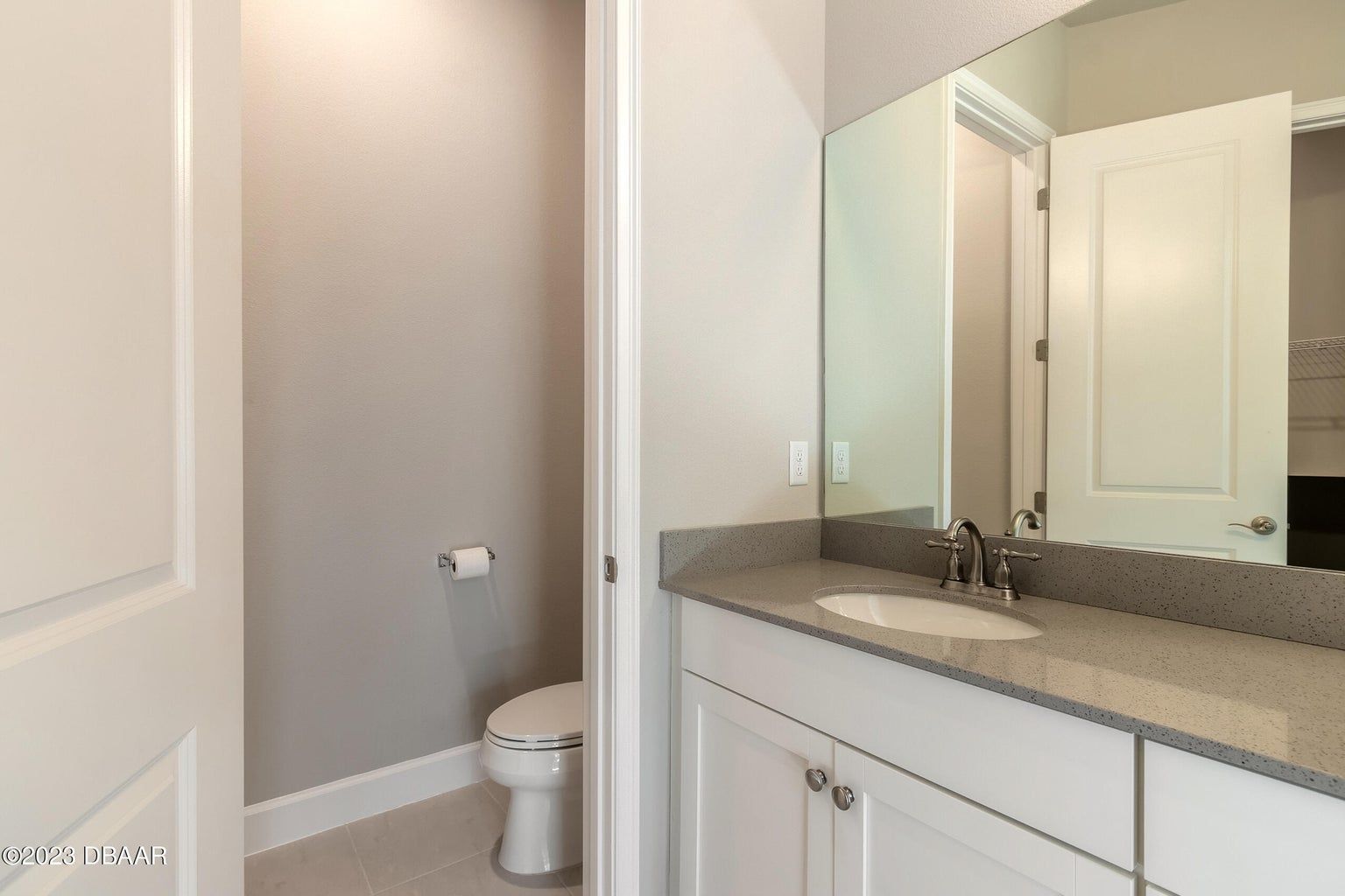 a bathroom with a toilet nook