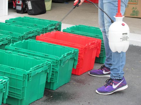 Cleaning colored bins at Beyond The Fork In The Road