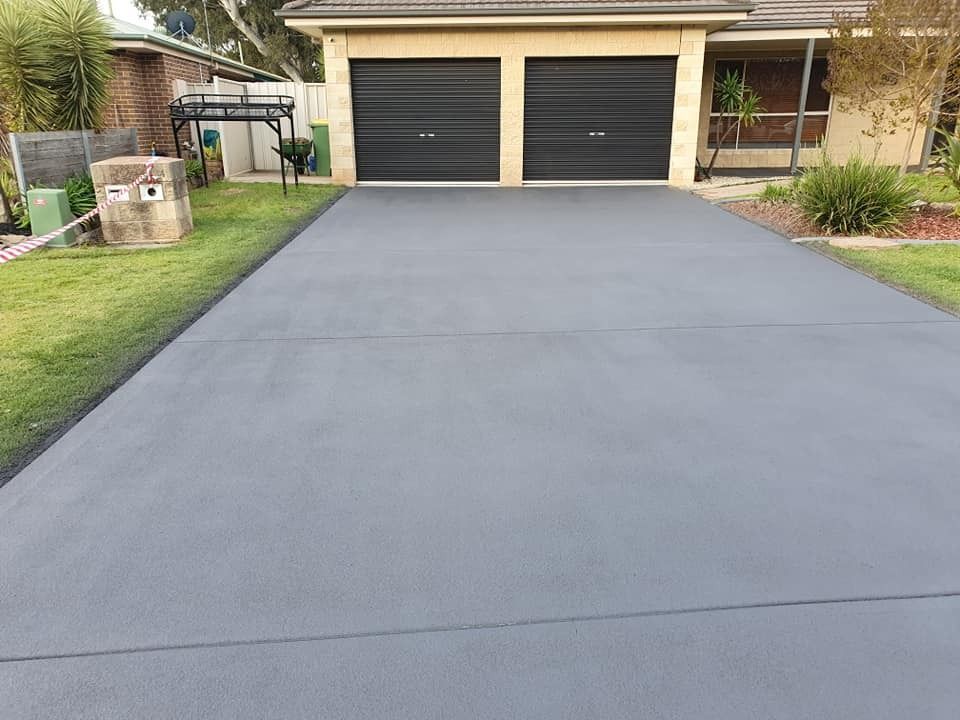 Smooth Gray Concrete Driveway