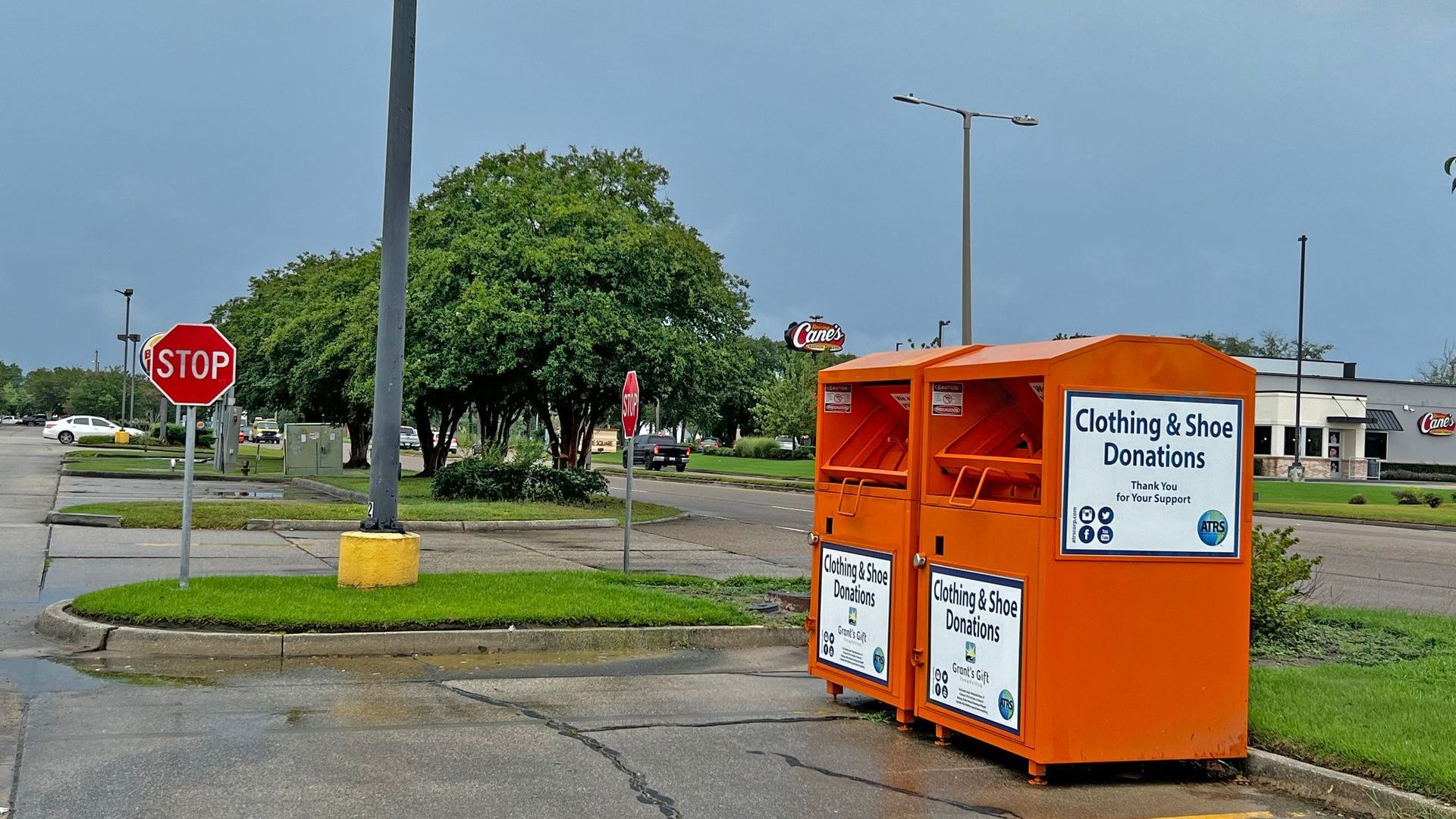 Image of ATRS orange clothing donation bins.