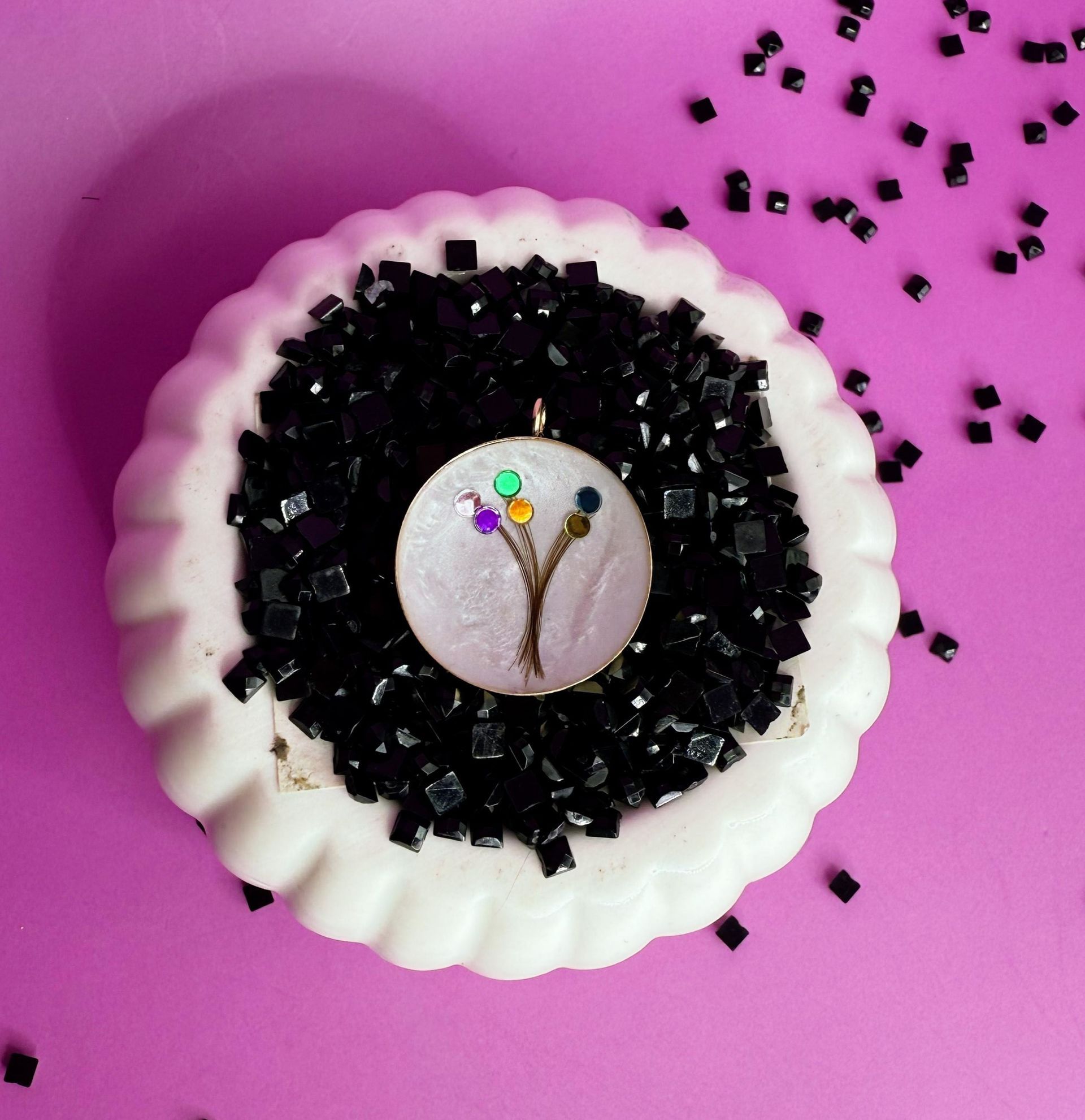 round pendant with details