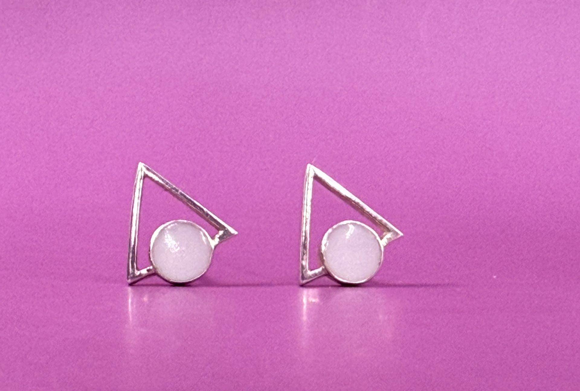 silver earings with triangle shape and round breastmilk stud