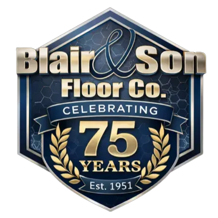 Gold and black 75th-anniversary logo for Blair & Son Floor Co., featuring crossed hammers and the years 1951-2026.