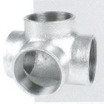 A close up of a stainless steel pipe fitting on a white surface.