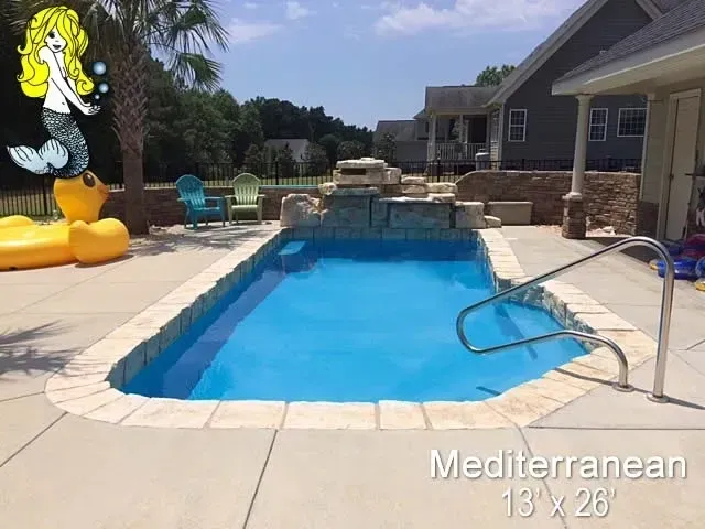 A picture of a Mediterranean swimming pool.