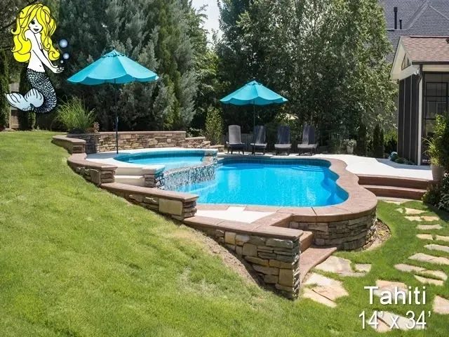 A large Tahiti swimming pool with umbrellas.