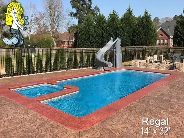 A Regal swimming pool with a slide.