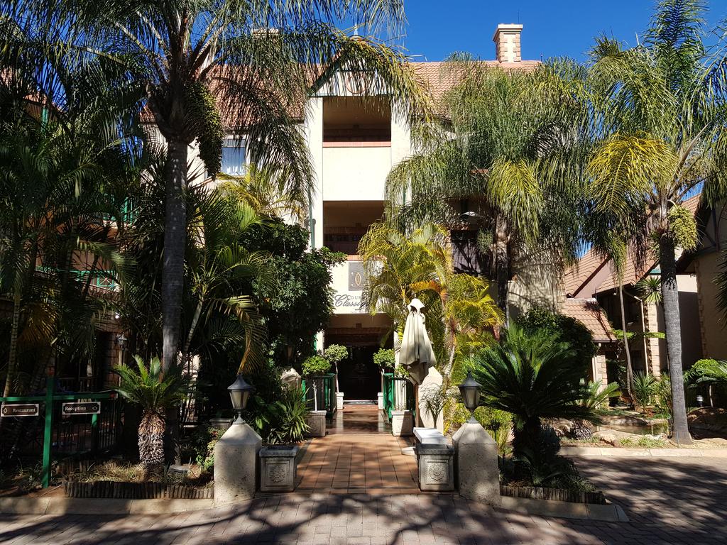 A building with a lot of trees in front of it