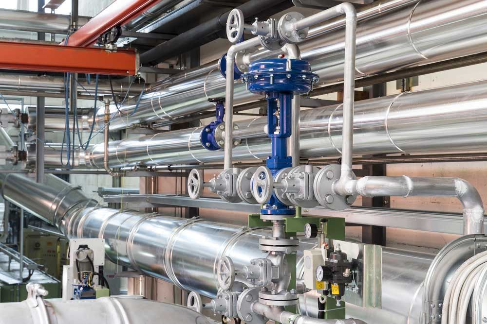 Factory With A Lot Of Pipes And Valves — Hitemp Compressed Air Services in Fairy Meadow, NSW