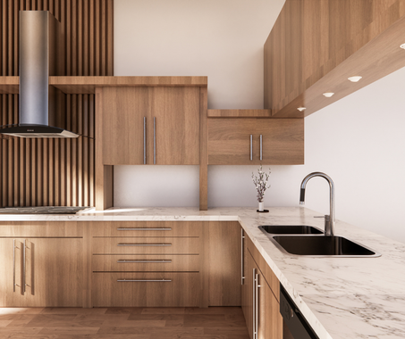 A kitchen with wooden cabinets and marble counter tops