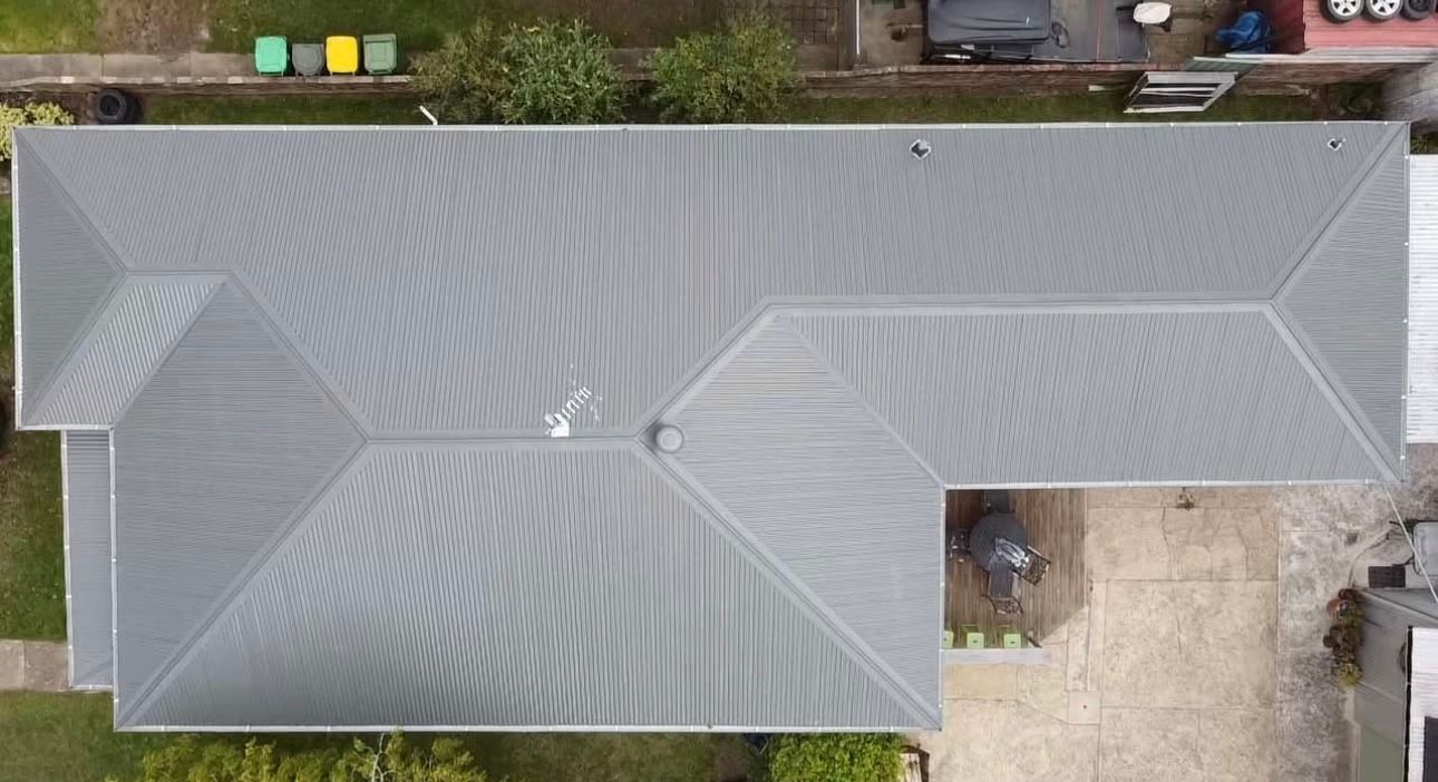 An Aerial View of a House With a Gray Roof — iFix Roofing Bendigo in Castlemaine, VIC