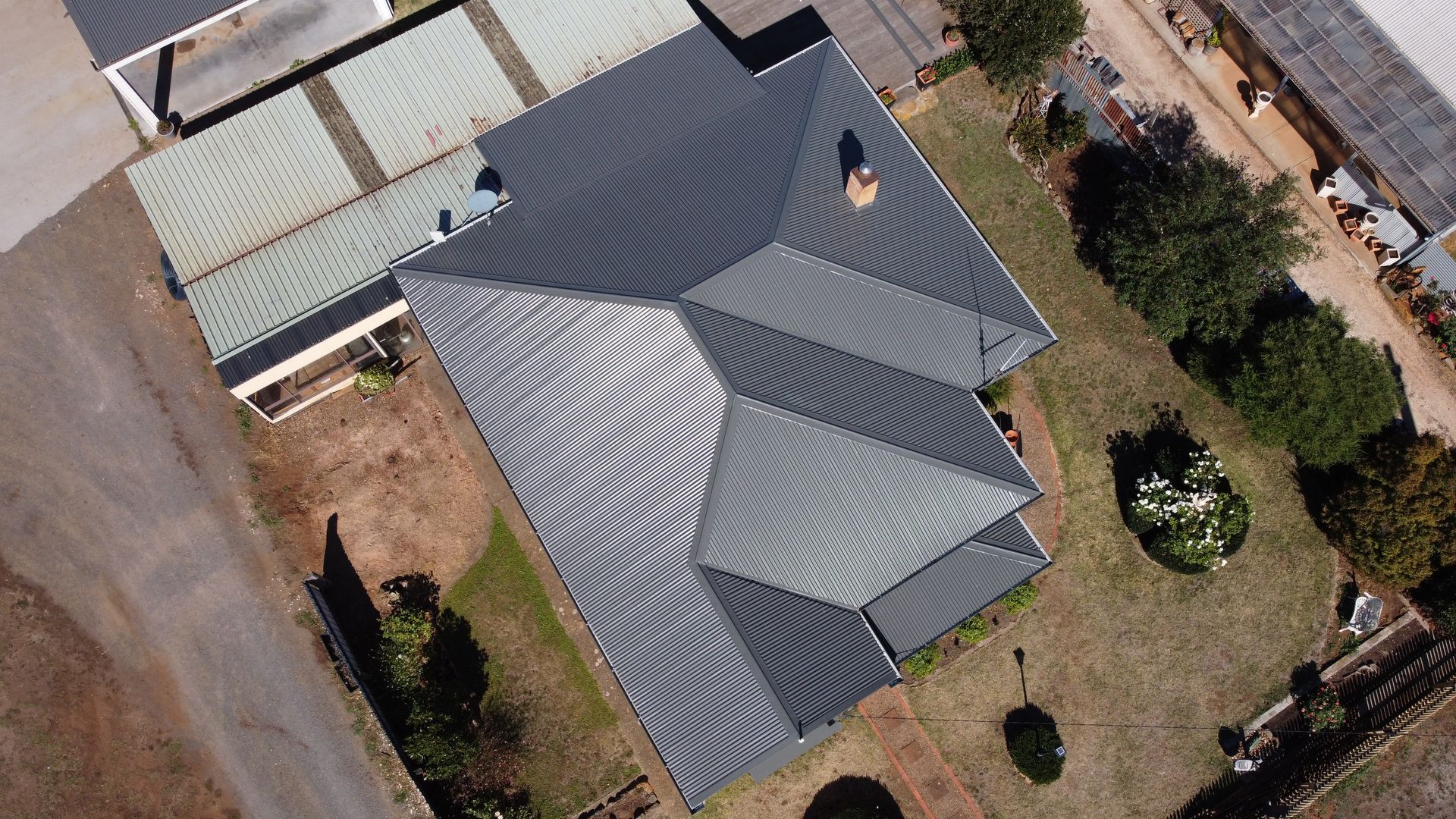 An aerial view of a house with a metal roof — iFix Roofing Bendigo in Bendigo, VIC