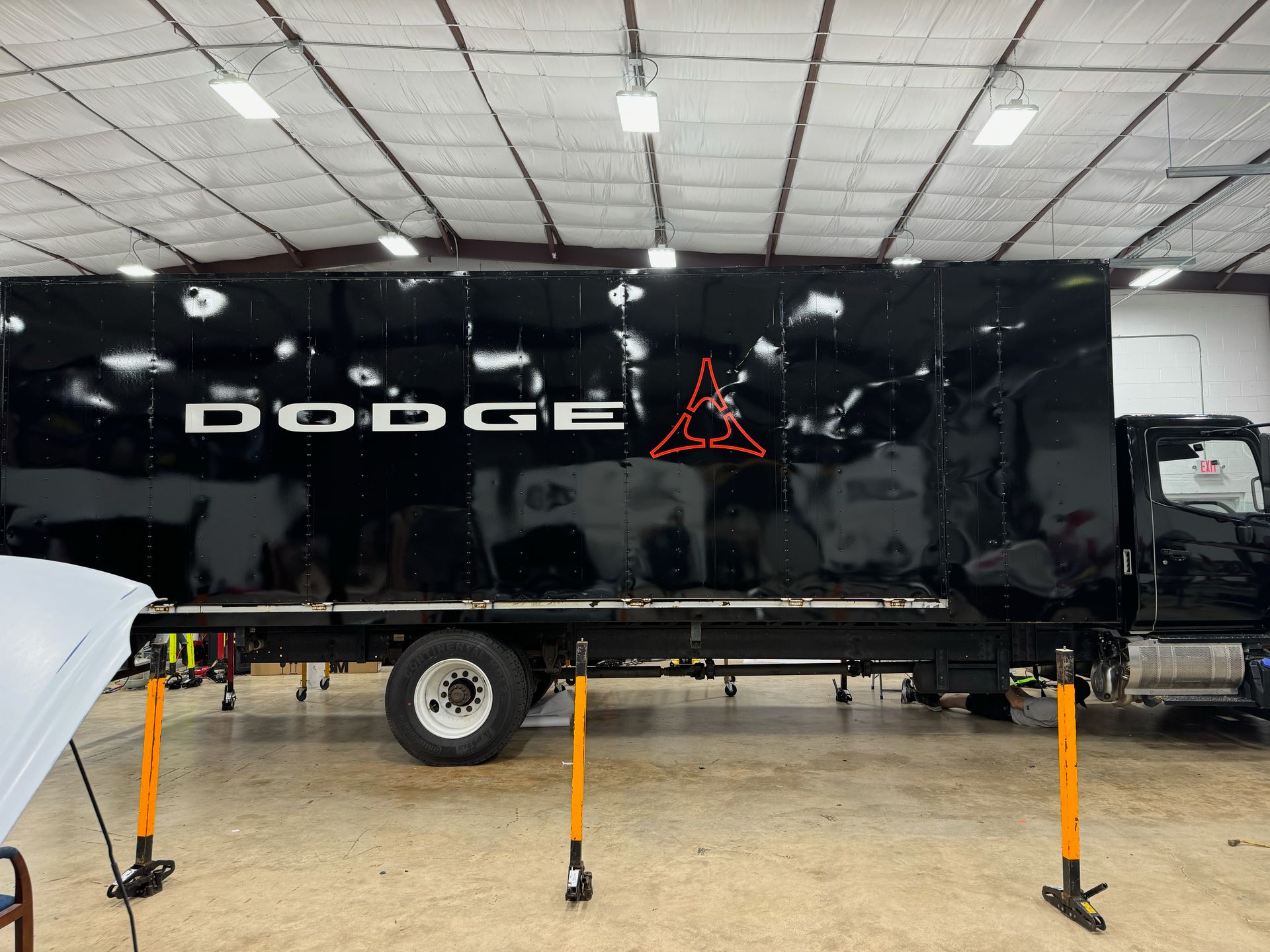 Wrapping an old box truck Ferrari trailer in Charlotte, NC | Certified Install Wraps