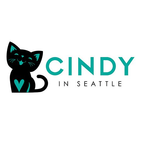 Black cat logo with teal heart and features, teal 