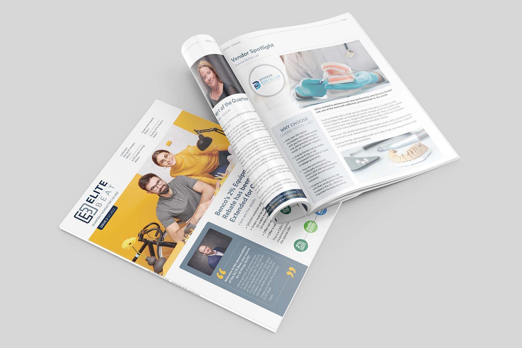 Open magazine pages with articles and photos; rolled up with another page.