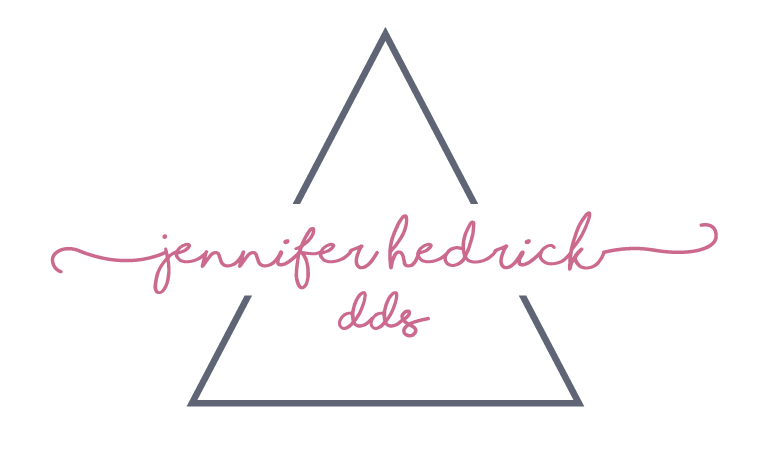 Jennifer Hedrick DDS logo: Pink script text within a grey triangle.