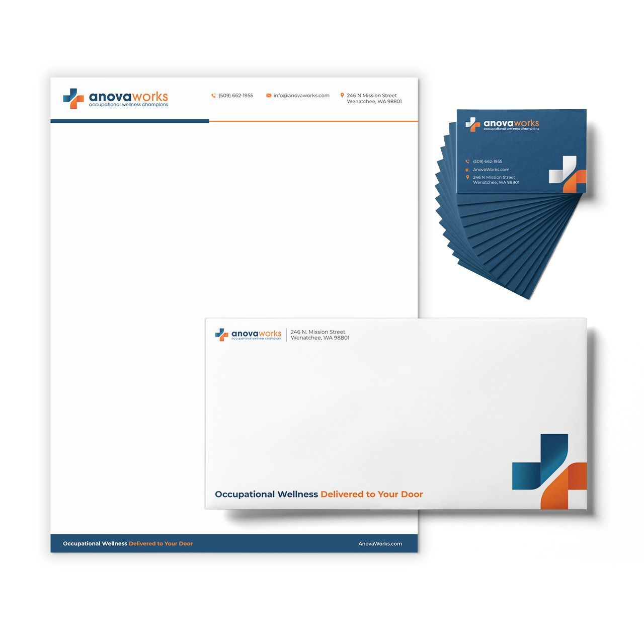 Stationery set: letterhead, envelope, and business cards with a blue and orange cross logo.