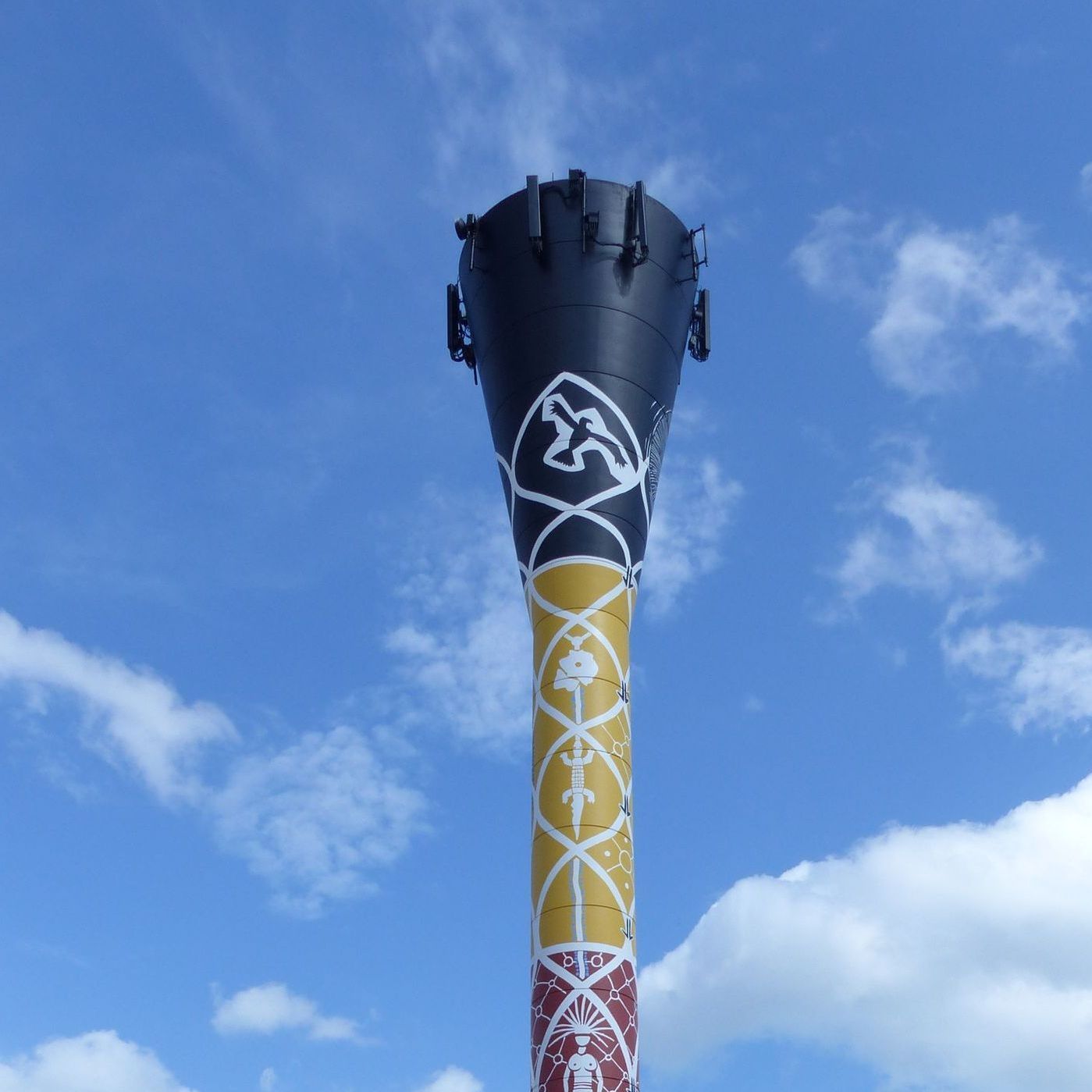 A water tower with an indigenous Australian art.