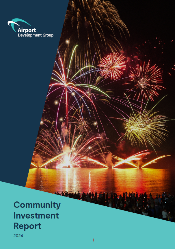 Cover: Fireworks over water, people watching. 