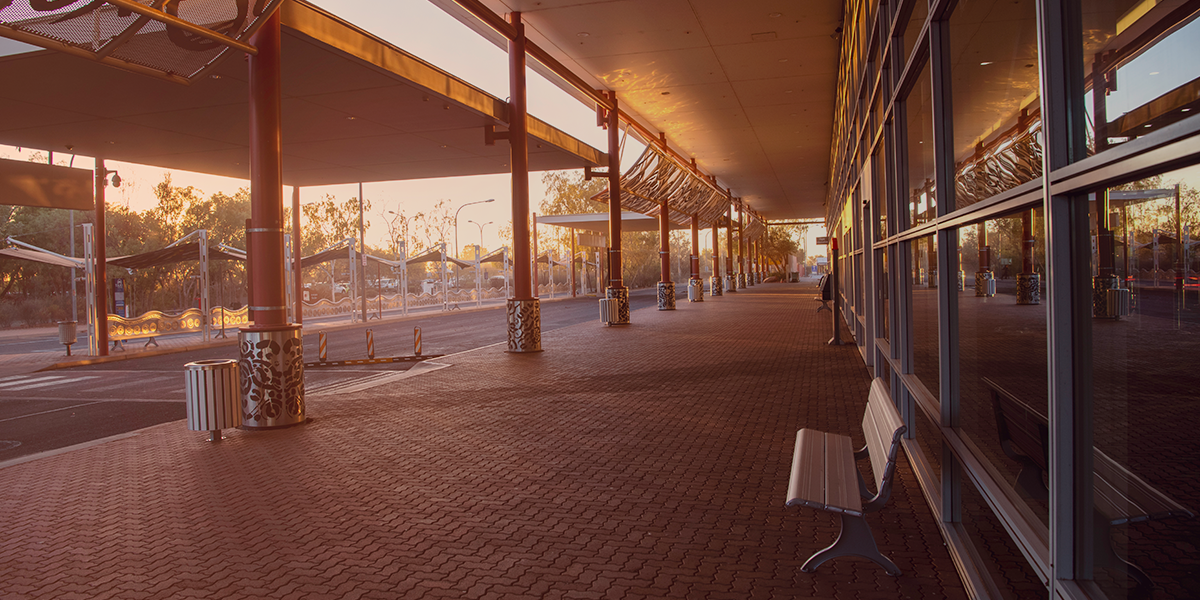 A bench outside the Alice Springs Airport terminal