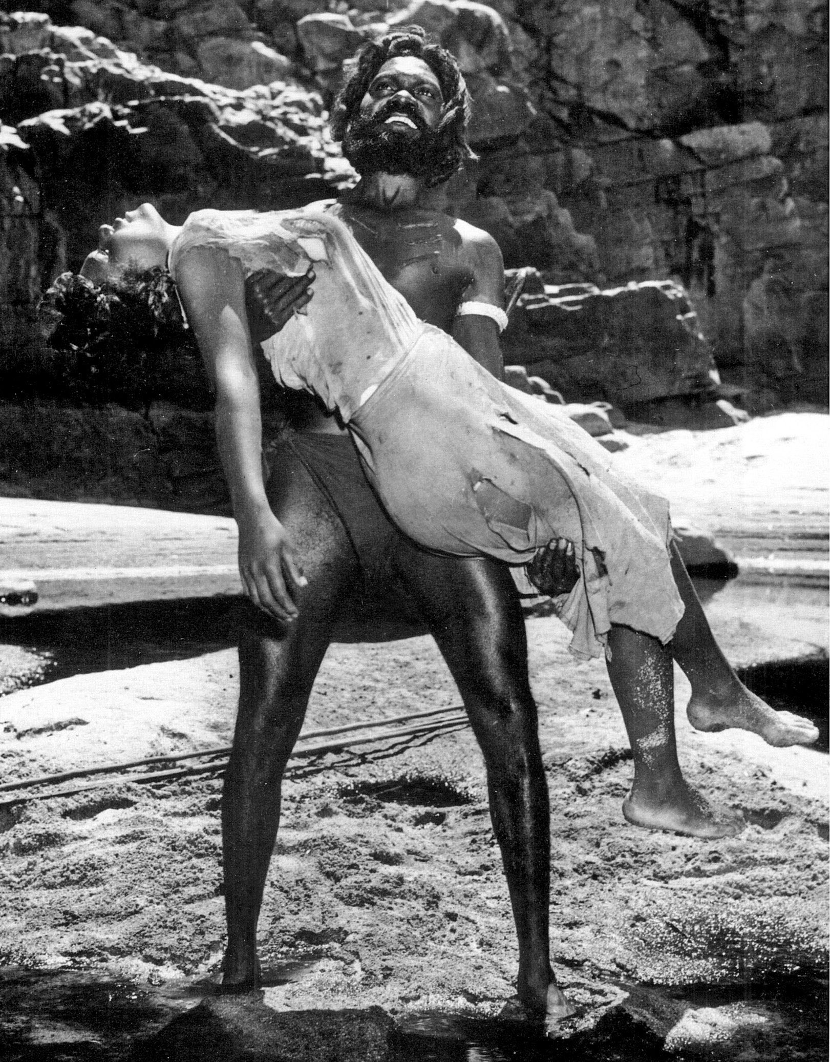 A man carrying a lady.
