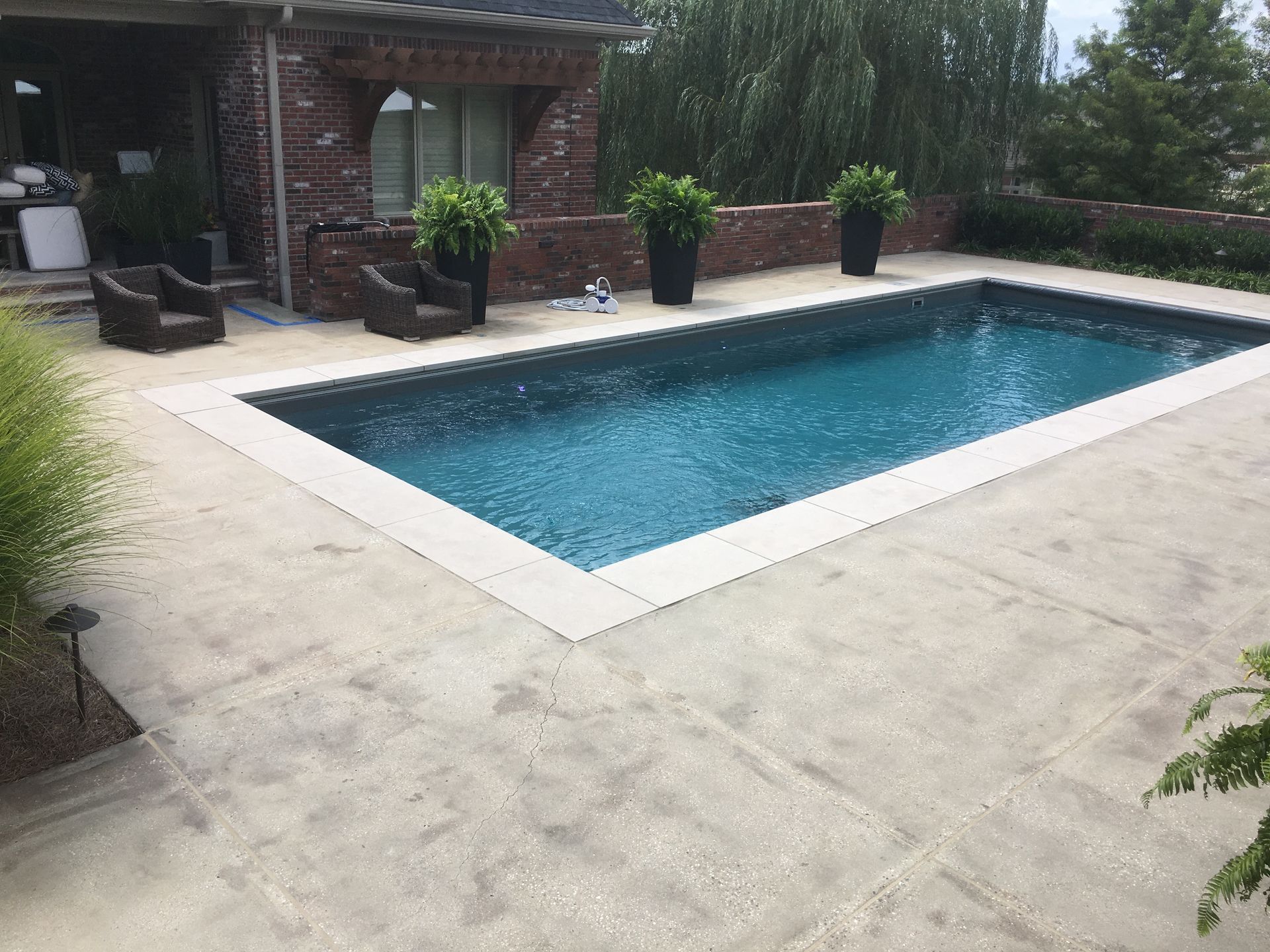 Concrete road surface with a gray expansion joint running down the center.