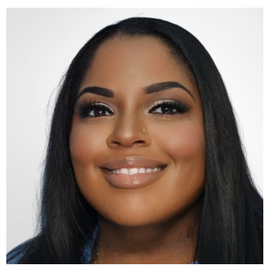 Woman with long dark hair smiles, wearing makeup, looking directly at the camera.