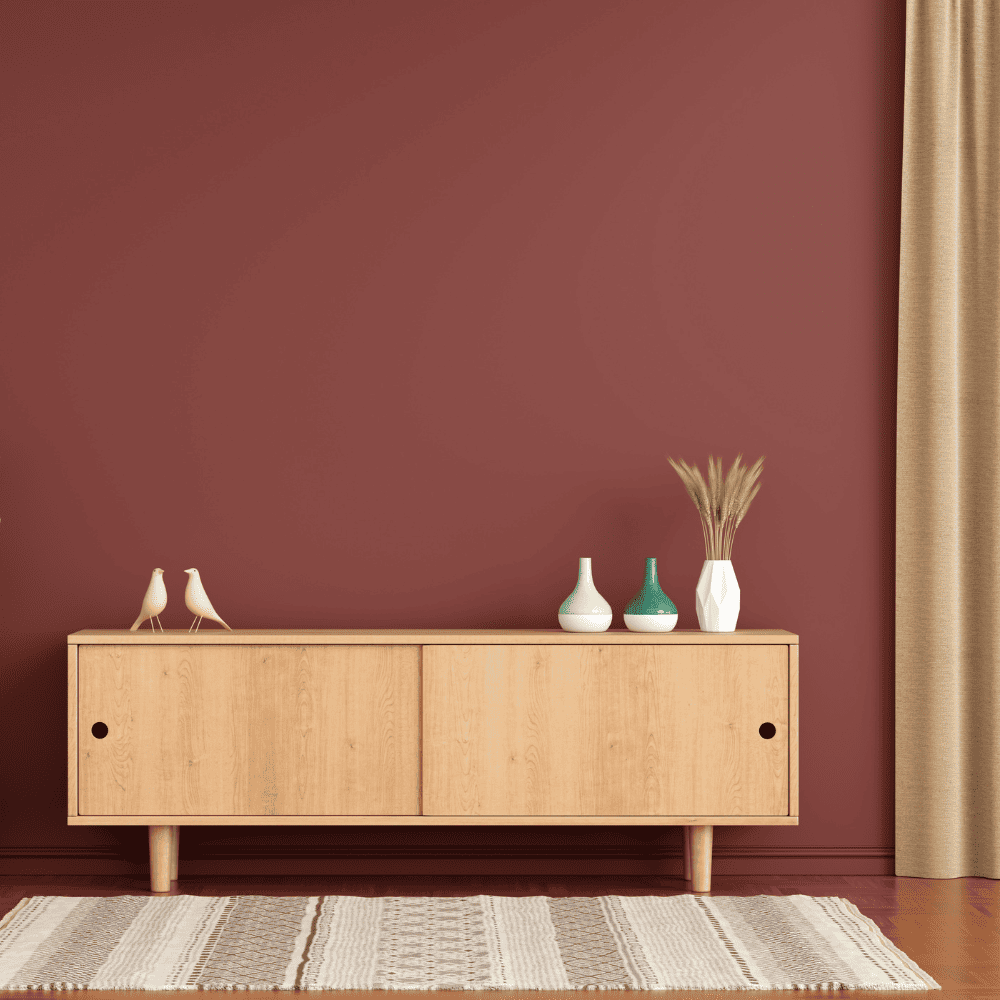 Living room with brown walls and a TV table