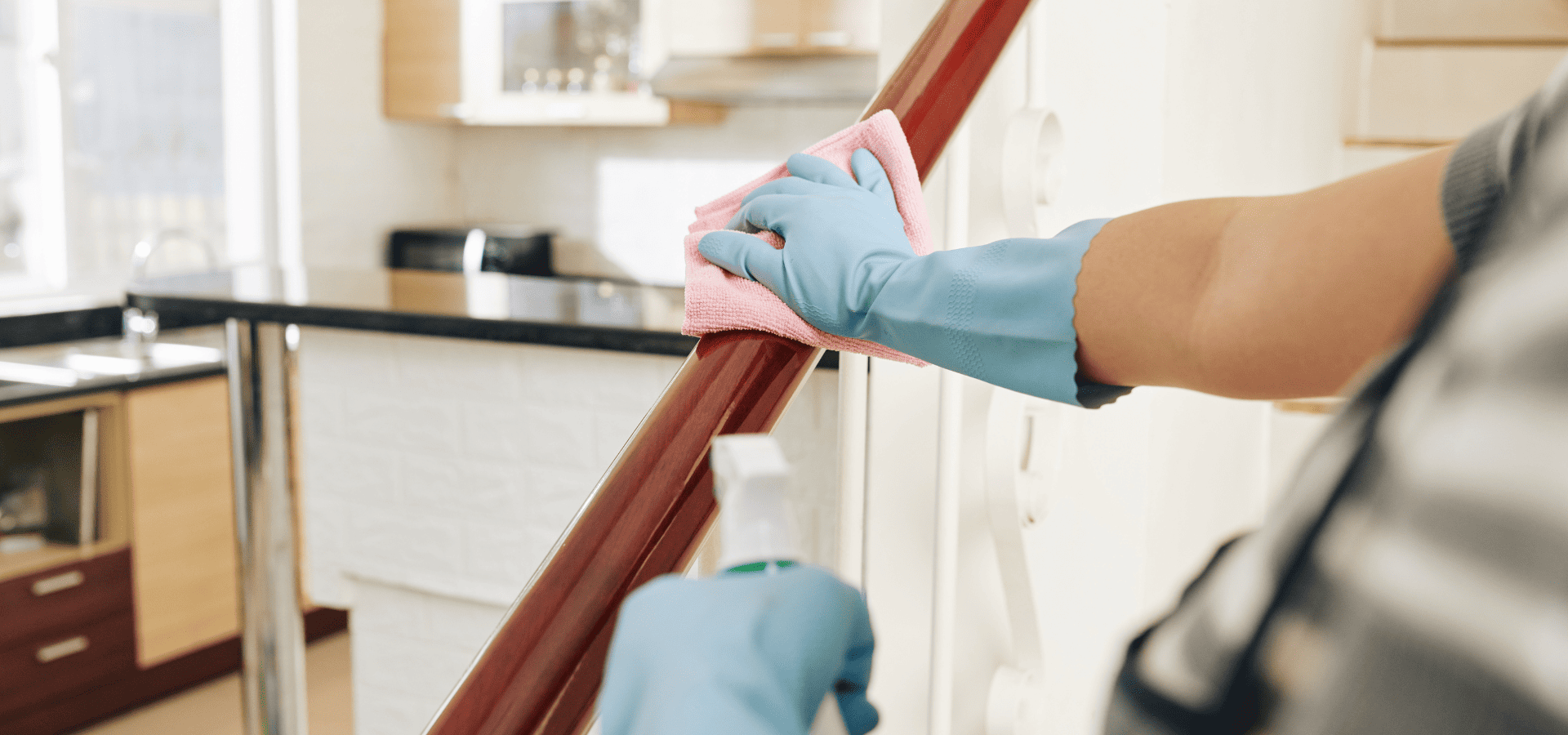 Cleaning stair railings with a mild detergent solution